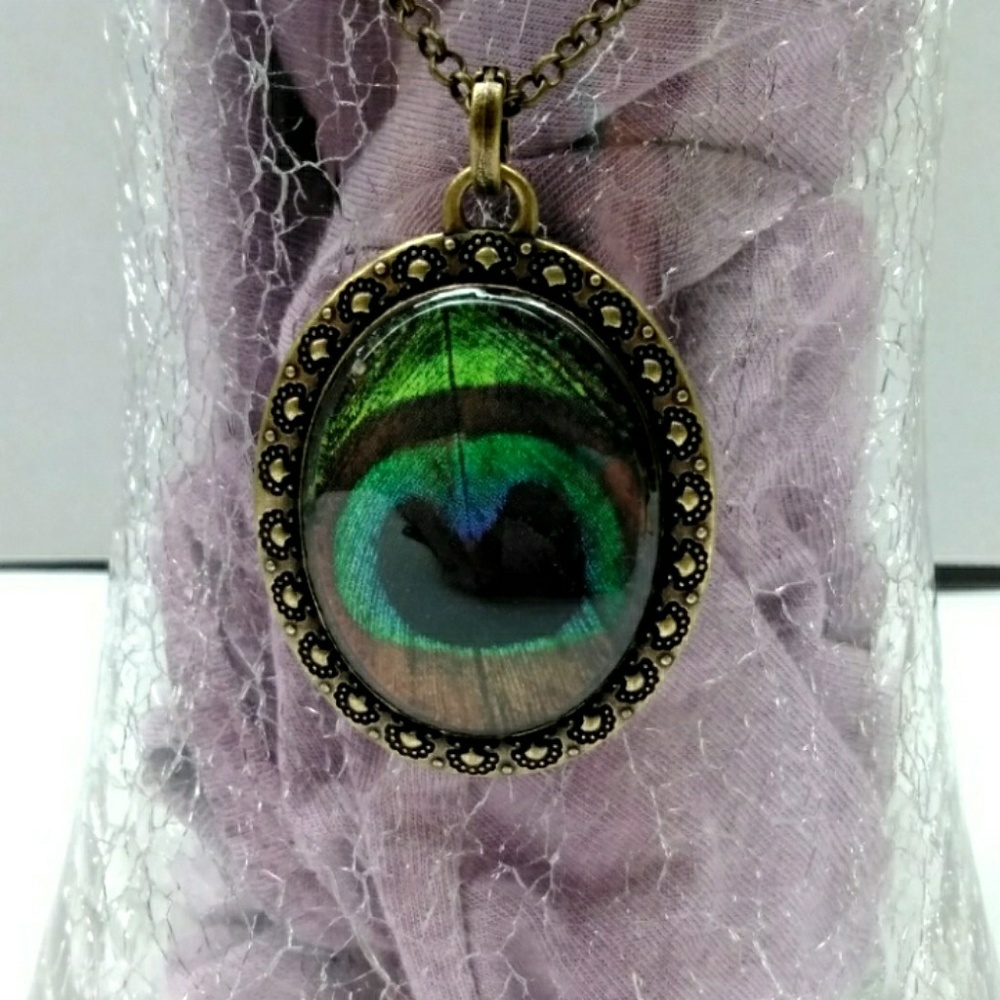 Peacock feather in bronze gold necklace